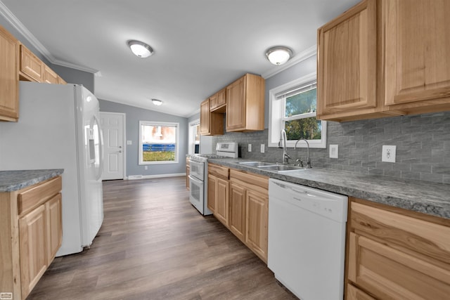 kitchen with dark hardwood / wood-style floors, sink, lofted ceiling, white appliances, and backsplash