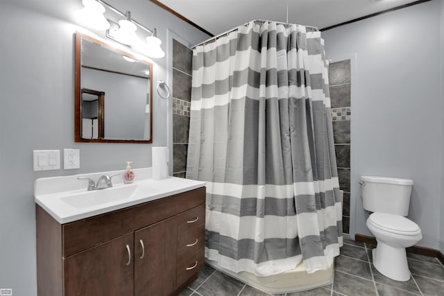 bathroom with tile patterned floors, a shower with curtain, vanity, and toilet