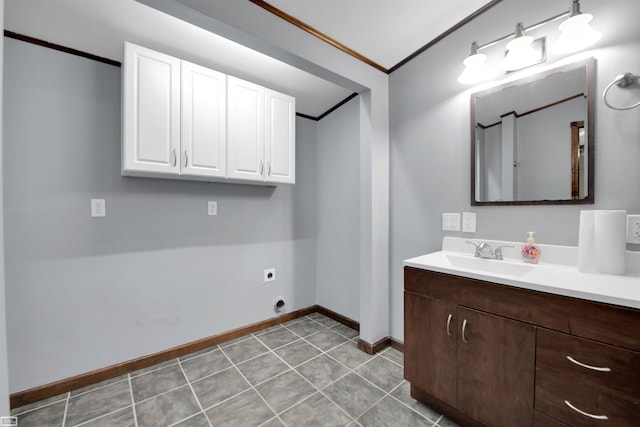 interior space with vanity, crown molding, and tile patterned flooring