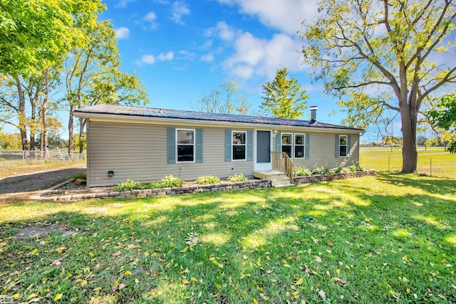 view of front of property with a front yard