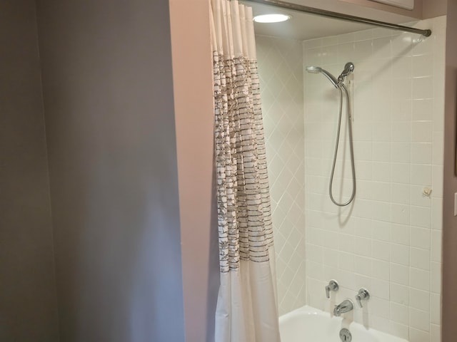 bathroom featuring shower / bath combo with shower curtain