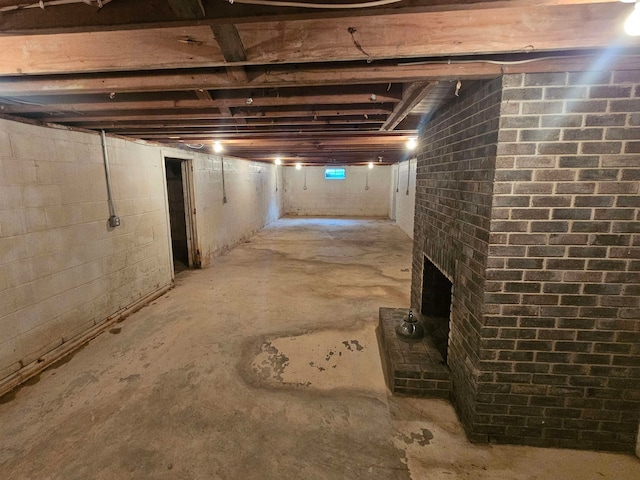 basement featuring a fireplace