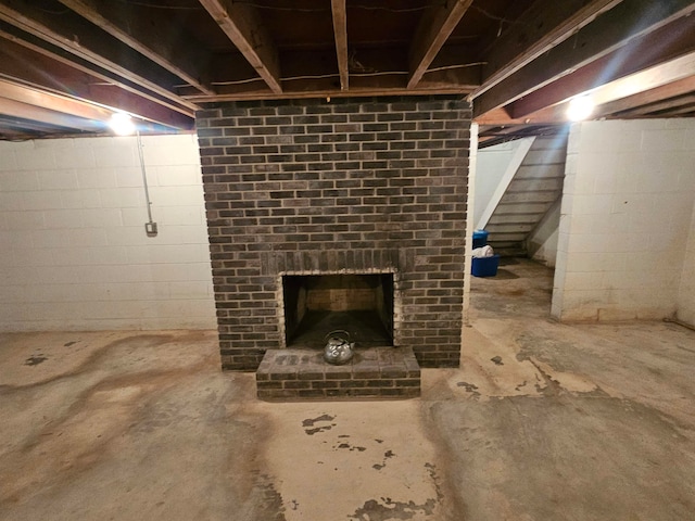 basement with a fireplace