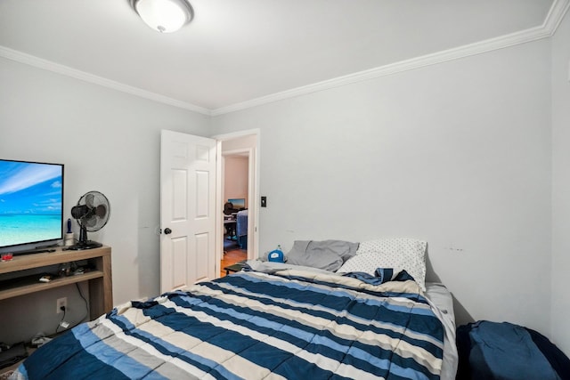 bedroom featuring ornamental molding