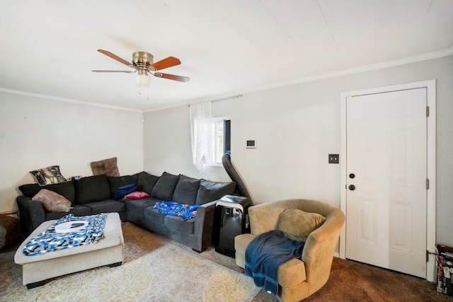 carpeted living room with crown molding and ceiling fan