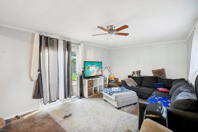 living room with crown molding, light carpet, and ceiling fan