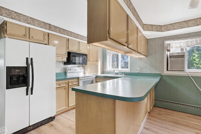 kitchen with sink, kitchen peninsula, white appliances, a baseboard radiator, and light wood-type flooring