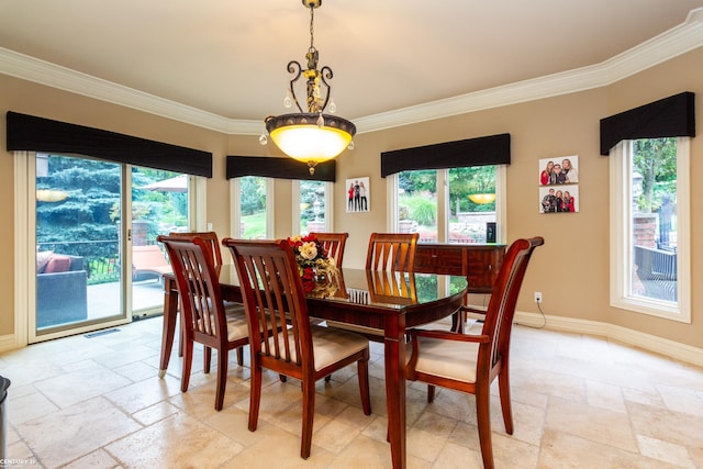 dining space featuring ornamental molding