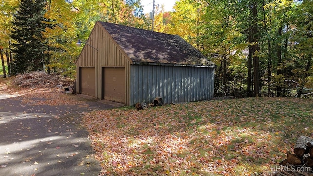 view of outdoor structure with a garage