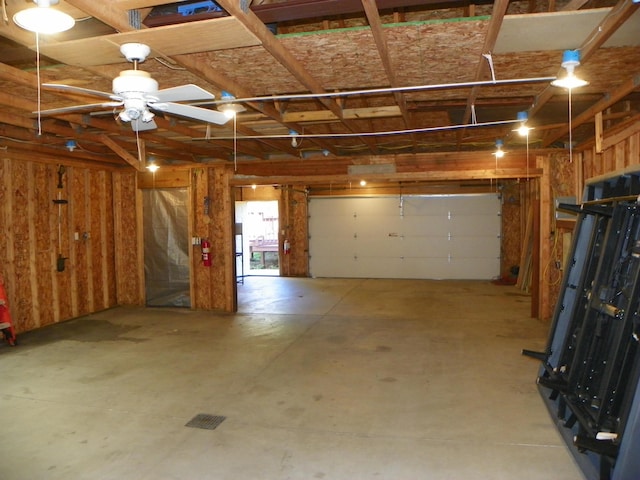 garage with ceiling fan