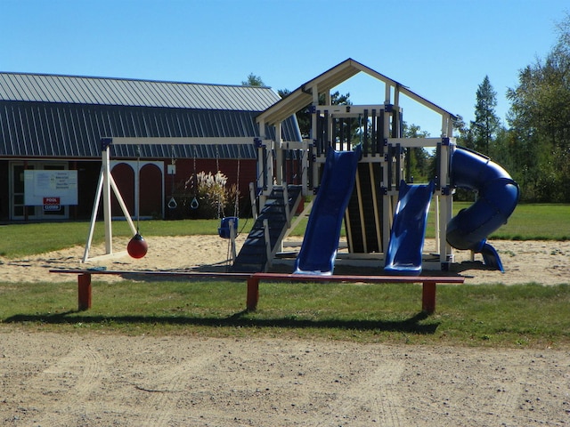 view of playground featuring a yard