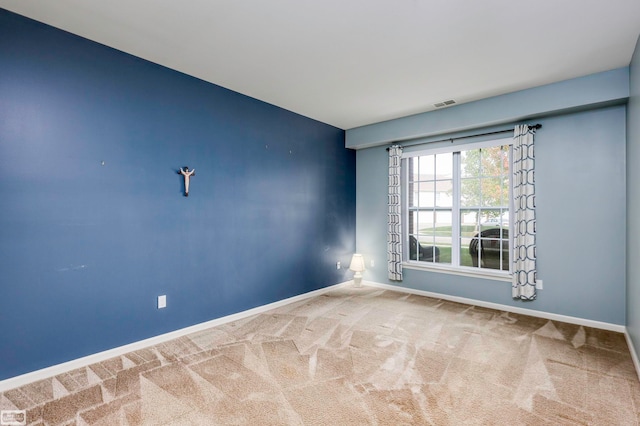 empty room featuring carpet floors