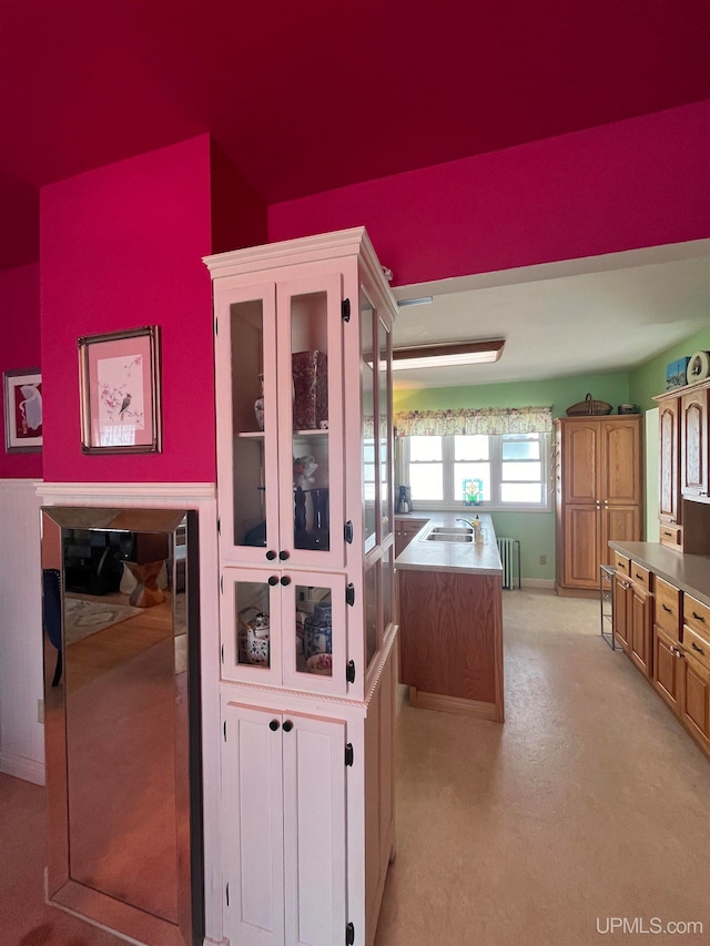 kitchen featuring a kitchen island and radiator