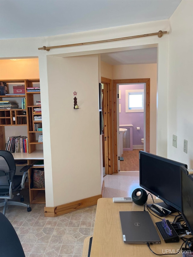 office with light tile patterned floors