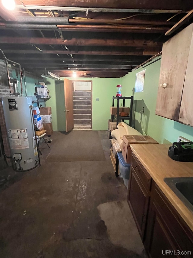 basement with sink and gas water heater