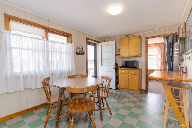 dining room with crown molding