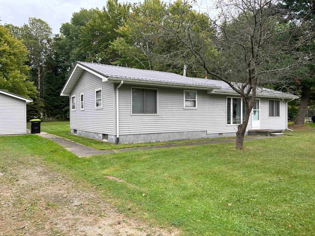 exterior space featuring a yard