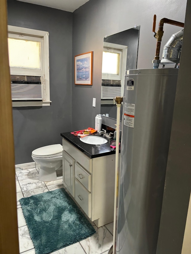 bathroom featuring vanity, toilet, cooling unit, and water heater