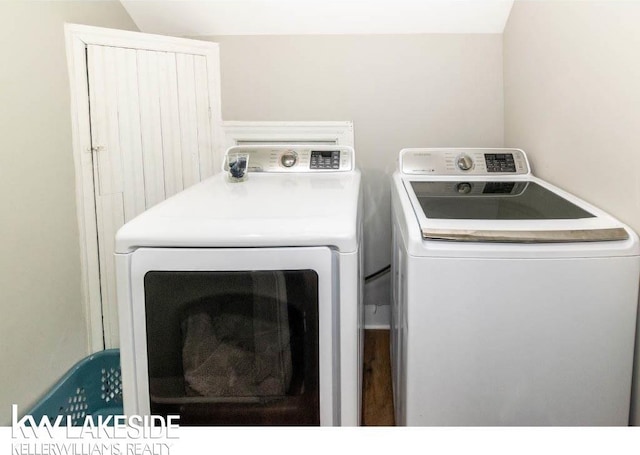 laundry room with washer and dryer