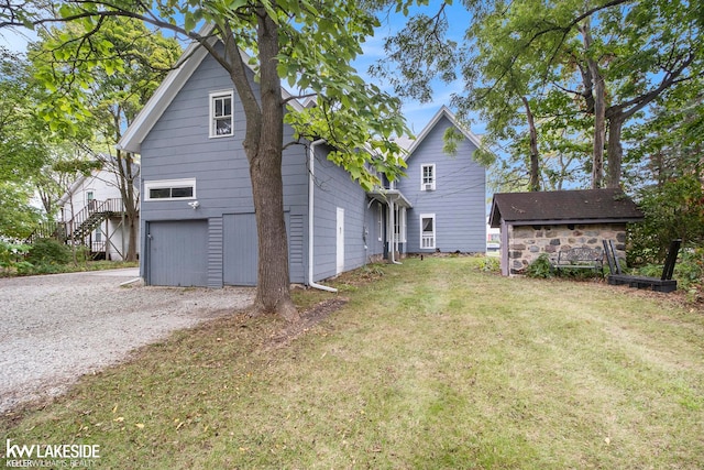 back of house with a yard