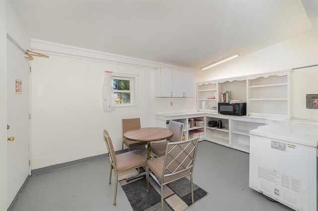 dining area with concrete floors