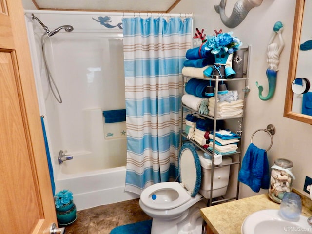 full bathroom featuring vanity, shower / tub combo, and toilet