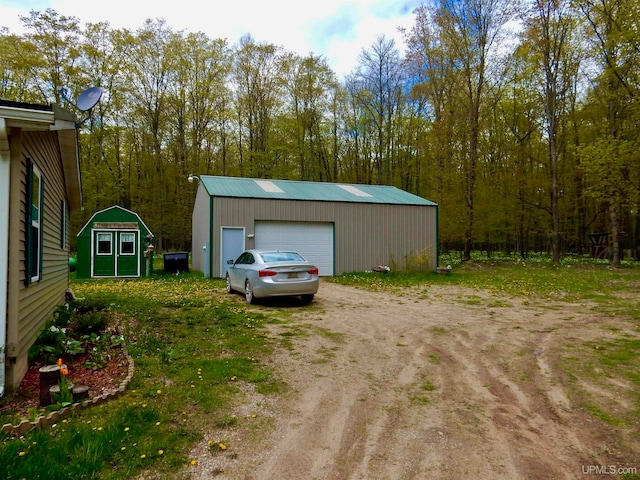 view of outbuilding with a garage