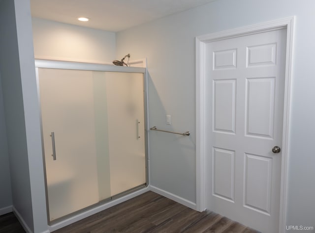 bathroom featuring wood-type flooring