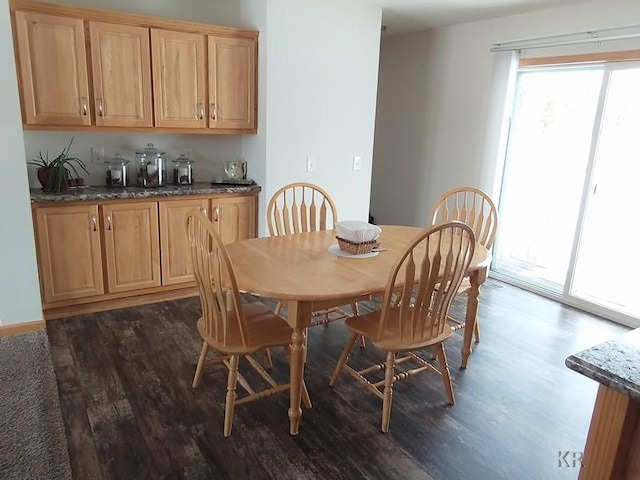 dining space featuring hardwood / wood-style flooring