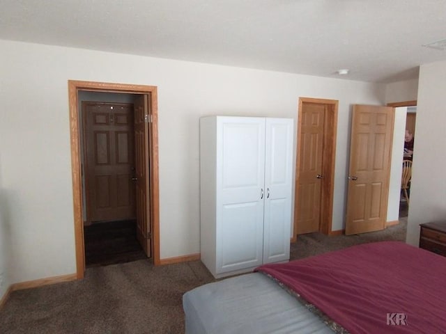 carpeted bedroom with a closet