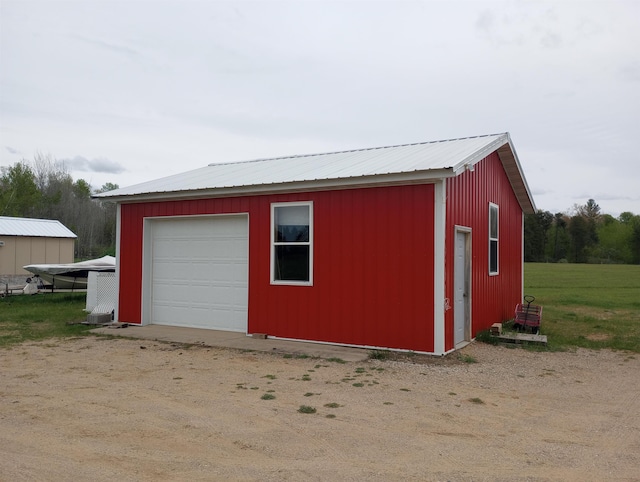 garage with wood walls