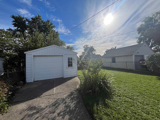 garage with a yard