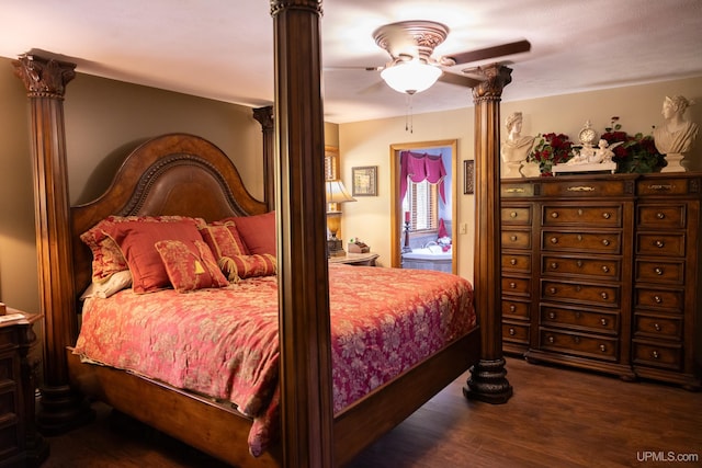 bedroom featuring dark hardwood / wood-style floors and ceiling fan