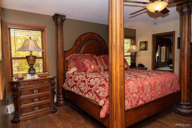 bedroom featuring ceiling fan and dark wood-type flooring