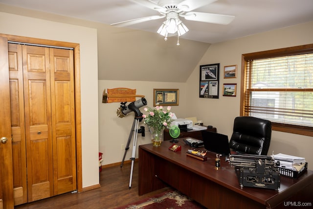 home office featuring ceiling fan, dark wood-type flooring, and vaulted ceiling