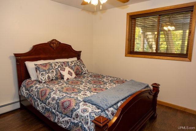 bedroom featuring dark hardwood / wood-style flooring and ceiling fan