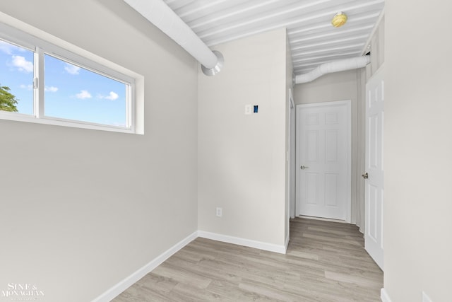 empty room with light hardwood / wood-style floors