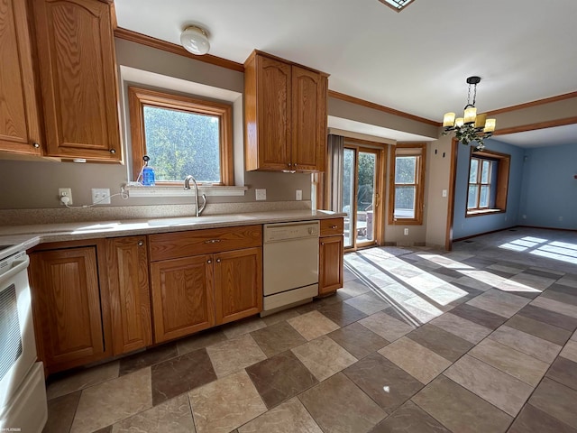 kitchen with a chandelier, sink, dishwasher, hanging light fixtures, and ornamental molding