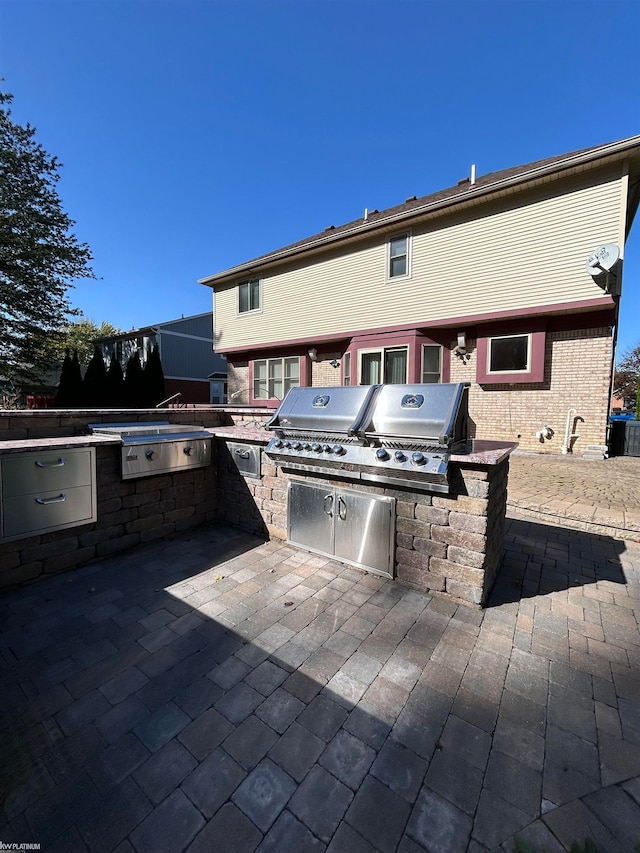 view of patio / terrace with an outdoor kitchen