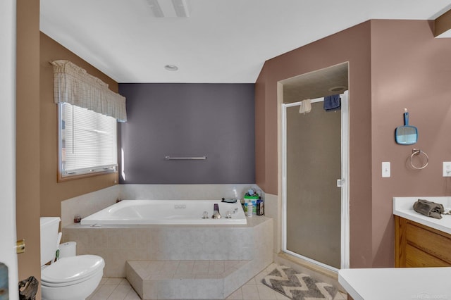 full bathroom featuring tile patterned flooring, shower with separate bathtub, vanity, and toilet