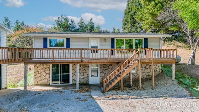 view of front of house with a wooden deck