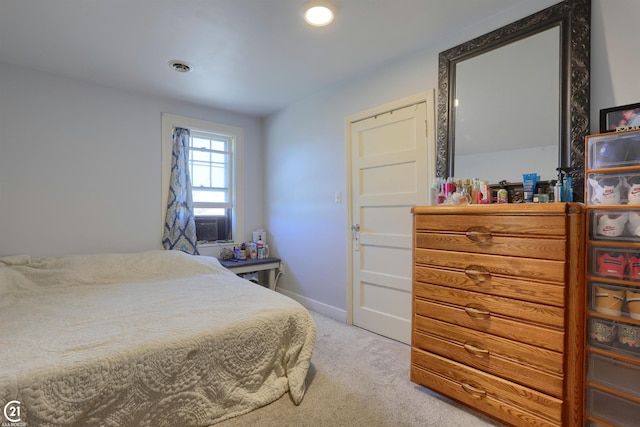 carpeted bedroom with cooling unit