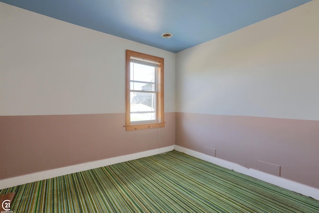 view of carpeted spare room