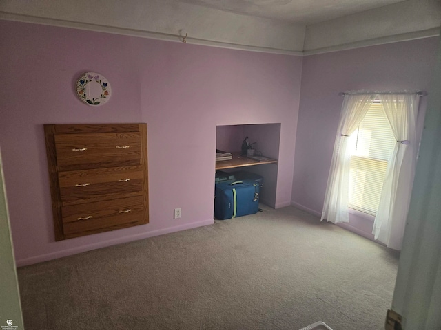 unfurnished bedroom with carpet