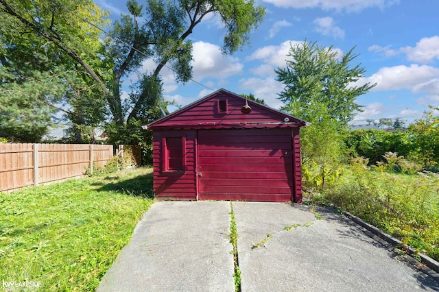 garage with a lawn