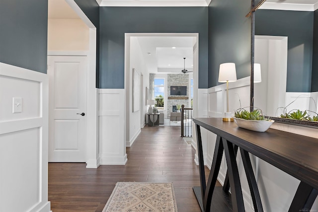 hall with dark hardwood / wood-style flooring