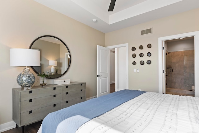 bedroom featuring ensuite bathroom and ceiling fan