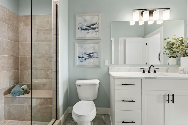 bathroom featuring an enclosed shower, tile patterned floors, vanity, and toilet