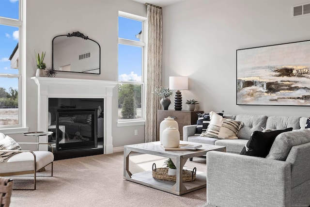 living room with light colored carpet