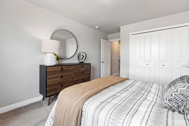 carpeted bedroom featuring a closet